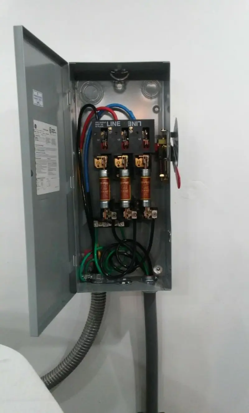 Three-phase disconnect switch installed for Smoke Detector Installation in Deephaven
